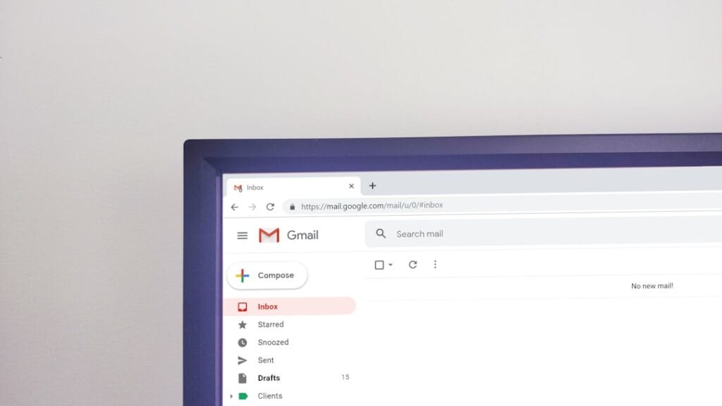 Gmail Storage Full? 5 Ways to Free Space Fast Gmail inbox displayed on a desktop monitor showing email messages and the sidebar navigation