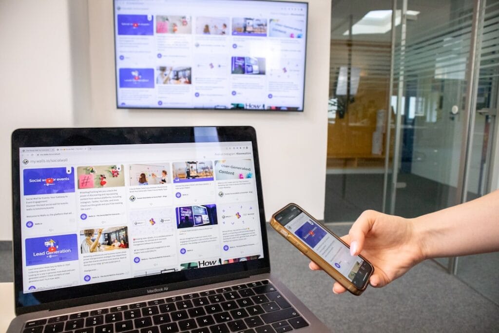 Responsive website displayed across laptop, desktop screen, and smartphone showing content adapting to different screen sizes