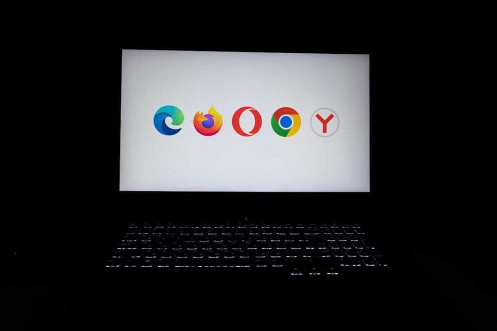 Multiple browser logos displayed on a laptop screen, illustrating where to paste a direct Google Drive download URL.